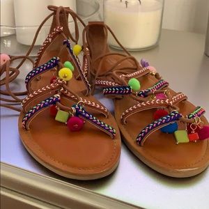 Gladiator sandals with Pom poms